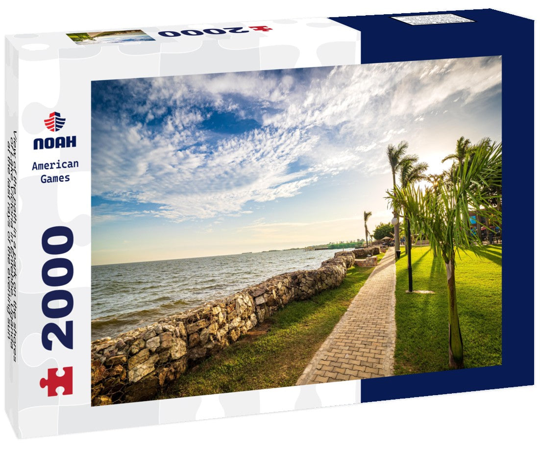 the path in a park on the shores of Lake Victoria in Entebbe, Uganda, at the last rays of the evening sun 2000pc Puzzle