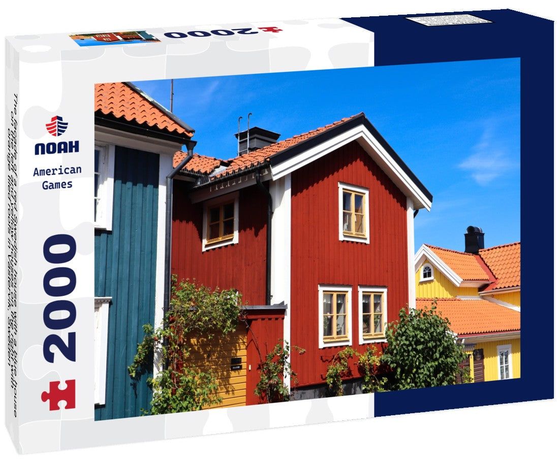 The facade of a red Swedish house with a blue house on the left and yellow houses on the right with orange tiled roofs in Västervik, Sweden 2000pc Puzzle