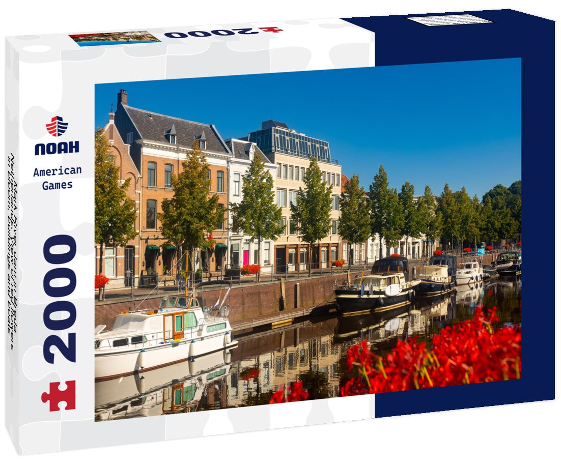 Mark River dam in Breda, Netherlands. View of red flowers in bloom, buildings and boats along the river banks 2000pc Puzzle