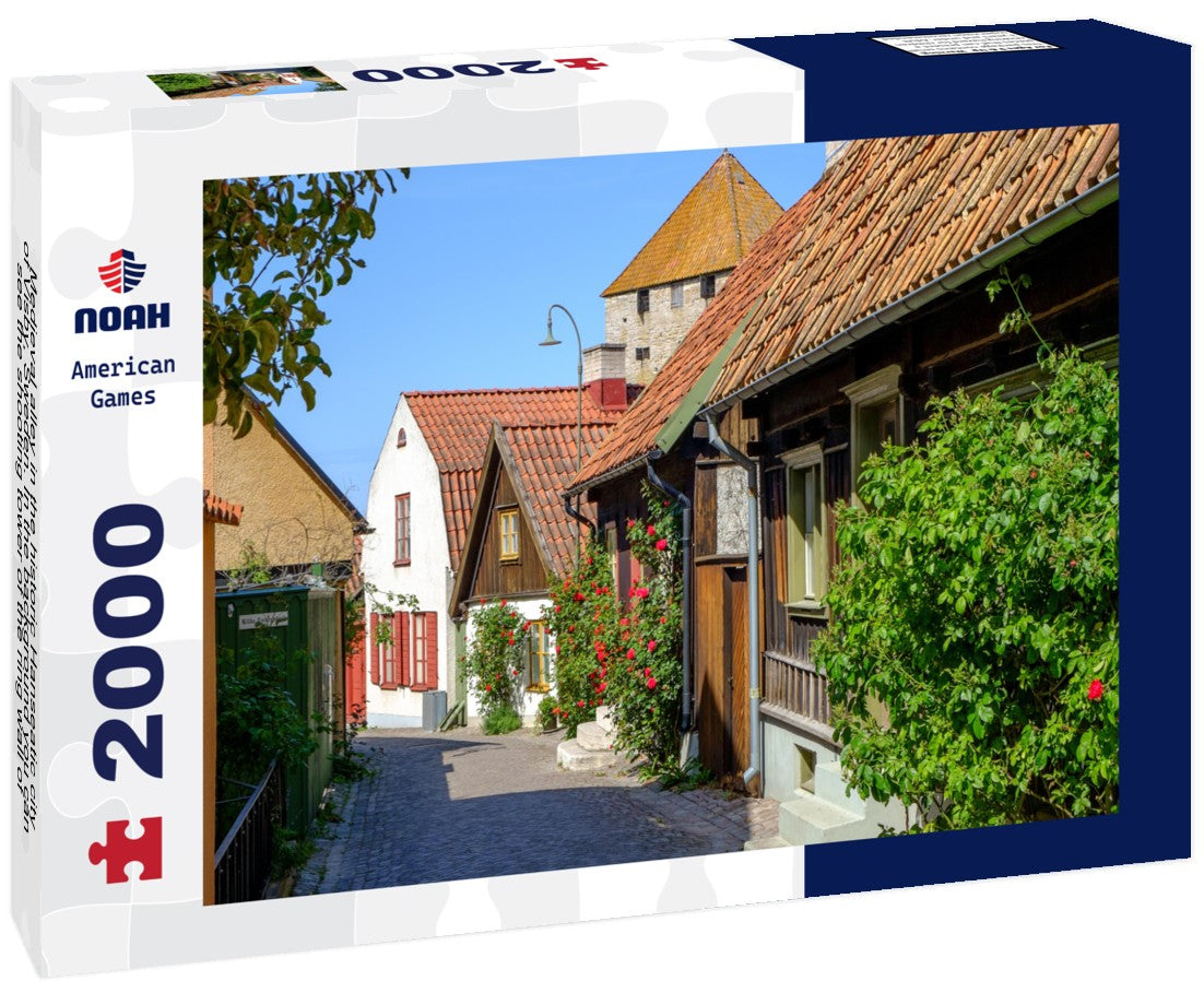 Medieval alley in the historic Hanseatic city of Visby, Sweden. In the background you can see the shooting tower of the ring wall of Visby, a UNESCO World Heritage Site 2000pc Puzzle