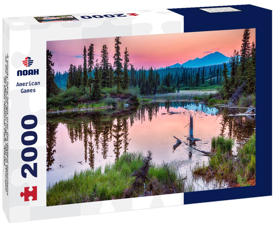 A smoky hare hangs over the distant mountains as the sun goes down over a lake in Wrangell-St Elias National Park, Alaska 2000pc Puzzle