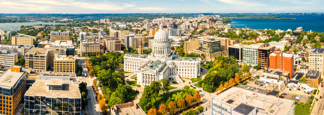 Wisconsin State Capitol and Madison skyline. The Wisconsin State Capitol, houses both chambers of the Wisconsin legislature, Supreme Court and the Office of the Governor 1000pc Panoramic Puzzle