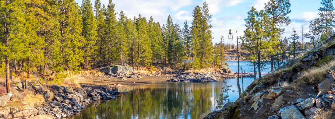 The Spokane River flows into the Post Falls Dam in the city of Post Falls Idaho in the Pacific Northwest 1000pc Panoramic Puzzle