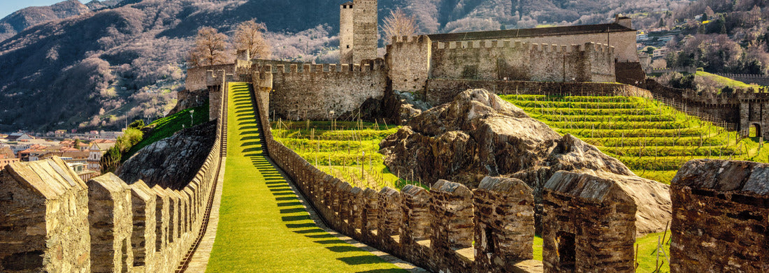 Walls and towers of Castelgrande, a castle in Bellinzona, a city in Ticino, Switzerland 1000pc Panoramic Puzzle