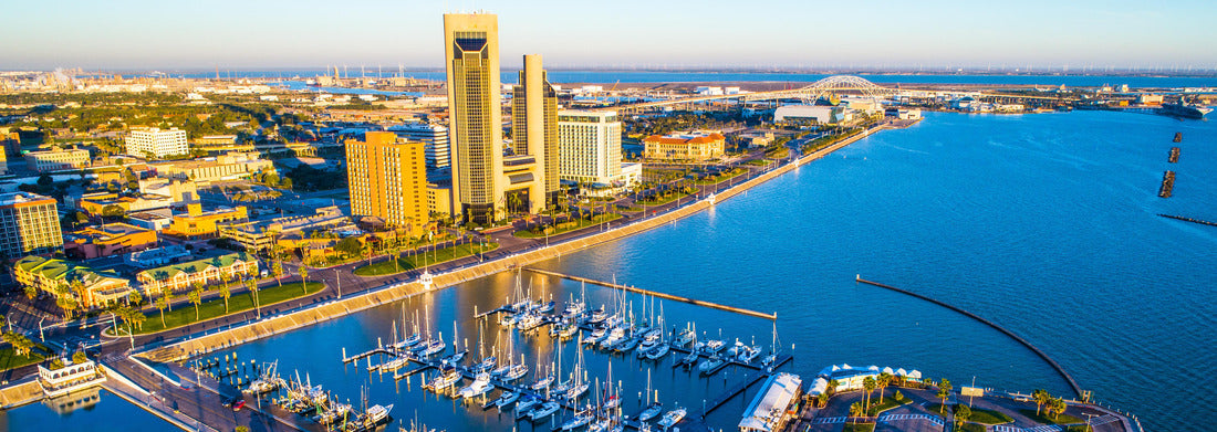The perfect morning over Corpus Christi Texas bayfront harbor and marina aerial drone view high above Gulf of Mexico coastal bend city skyline cityscape with Harbor Bridge and reflections off water 1000pc Panoramic Puzzle