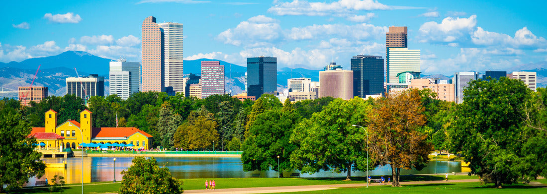 Noah Jigsaw Puzzle Green City Park View of Denver Colorado downtown skyline rising behind green city park tree line with Rocky Mountain background wide panoramic view panorama 1000 pieces