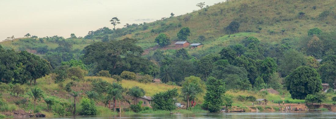 Noah Jigsaw Puzzle African fisherman rowing boat on Ubangi River, fishing in Bangui capital of Central African Republic. Traditional wooden boat made by African villagers panorama 1000 pieces