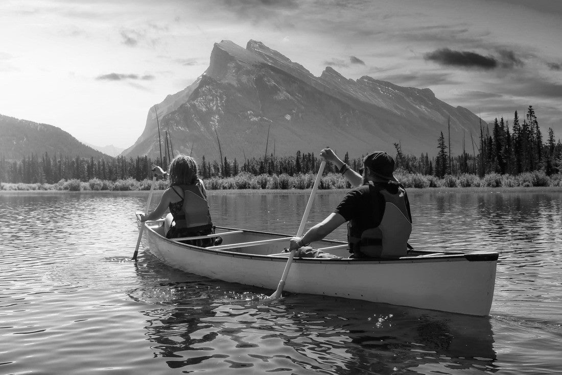 Noah Jigsaw Puzzle Some adventurous friends are canoeing in a lake surrounded by the Canadian mountains. Colorful sunrise sky art render. In Vermilion Lakes, Banff, Alberta, Canada in black white 2000 pieces