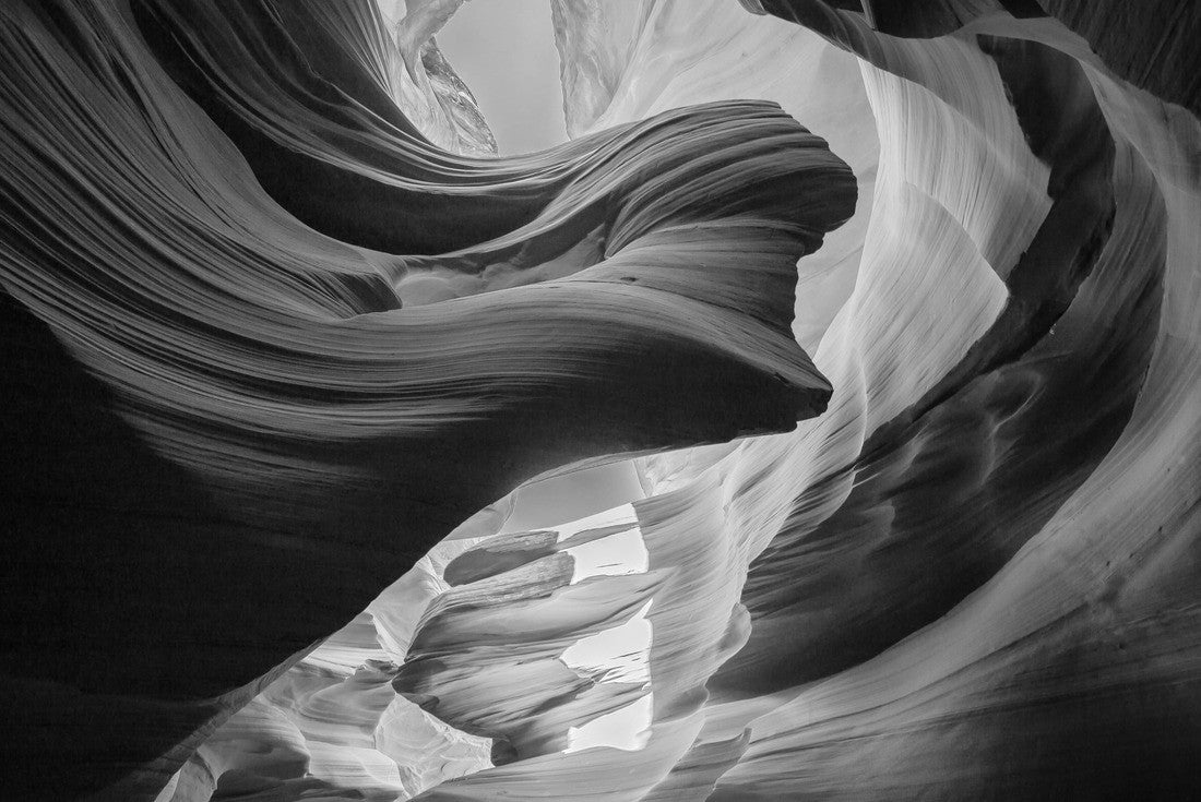 Beautiful wide angle view of amazing sandstone formations in the famous Antelope Canyon on a sunny day with blue sky near the old town of Page at the Powell River, American Southwest, Arizona, USA 2000pc PuzzleBlack and White