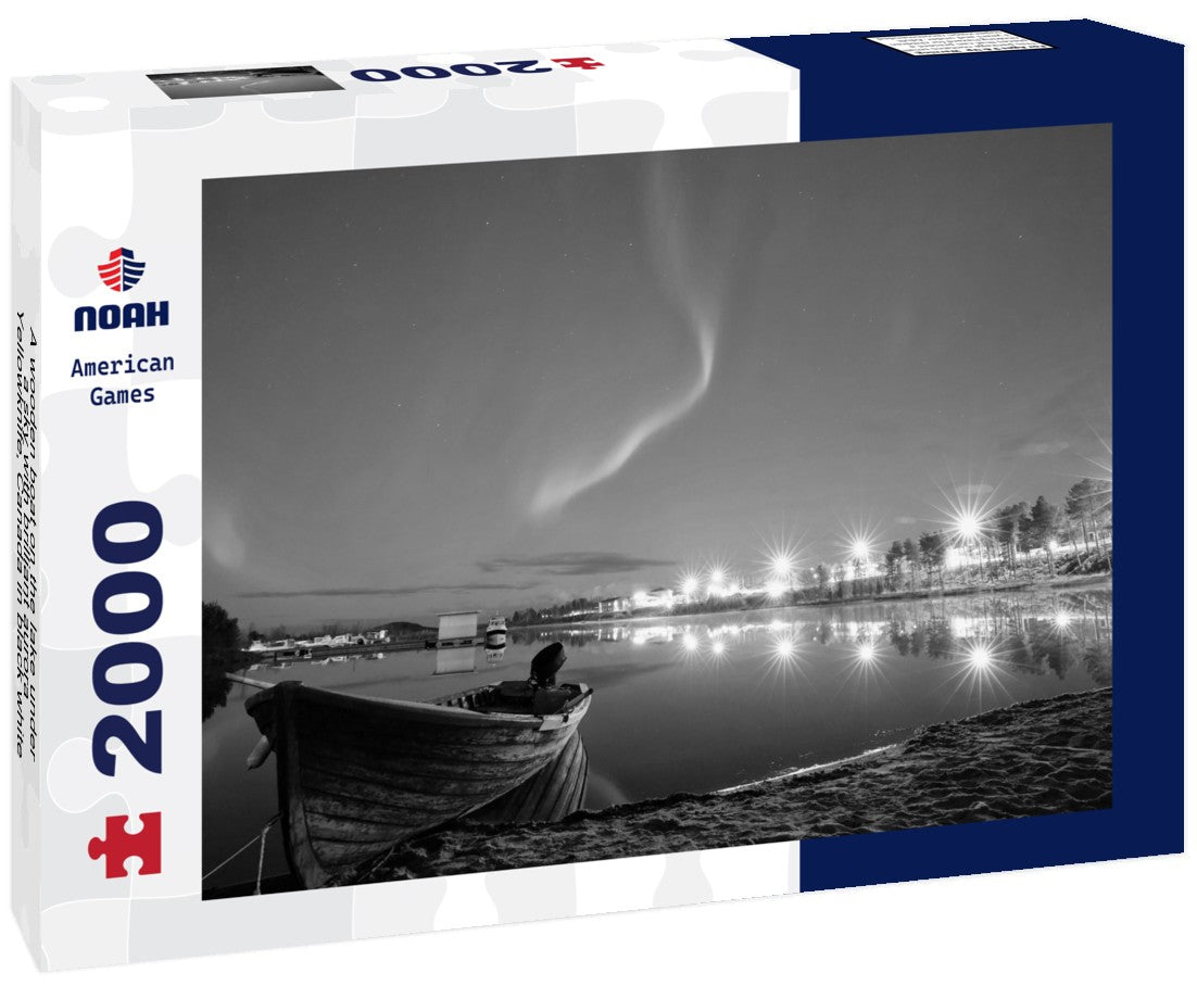 A wooden boat on the lake under a sky with brilliant aurora, Yellowknife, Canada 2000pc PuzzleBlack and White