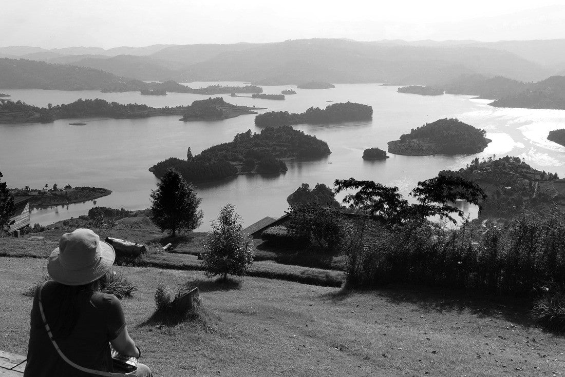Woman taking a Lake Bunyonyi (place of many small birds) from Arcadia cottages in southwestern Uganda between Kisoro and Kabale, East Africa 2000pc PuzzleBlack and White