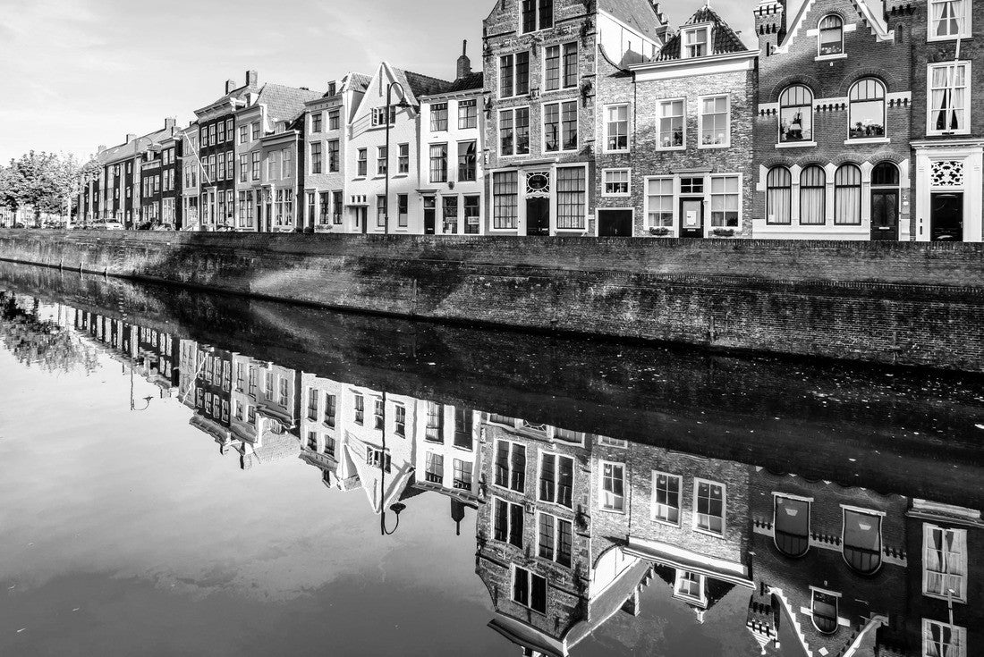 Sunset over a row of houses reflected on the surface of a canal in the historic town of Middelburg in the province of Zeeland, Netherlands 2000pc PuzzleBlack and White
