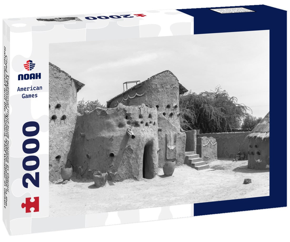 Traditional mud-built houses in Gaoui, Chad N'Djamena. Ancient antique houses in the Sahel desert and the Sahara. Hot weather in desert climate at the Chari River 2000pc PuzzleBlack and White