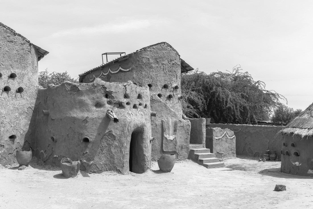 Traditional mud-built houses in Gaoui, Chad N'Djamena. Ancient antique houses in the Sahel desert and the Sahara. Hot weather in desert climate at the Chari River 2000pc PuzzleBlack and White