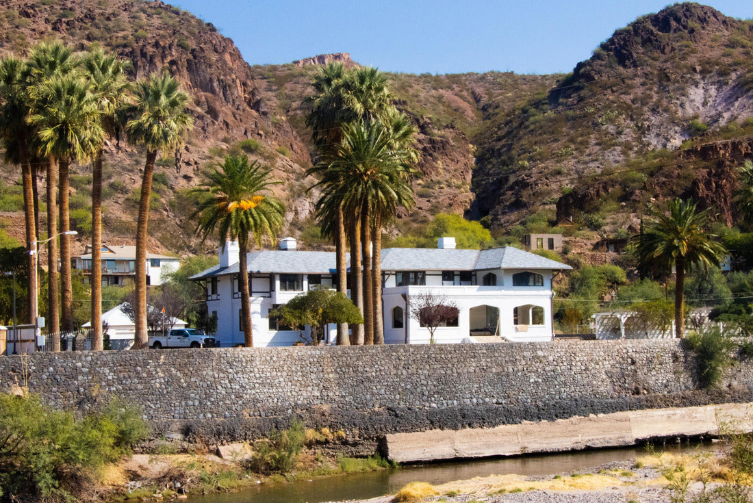 A building in Clifton, Arizona, surrounded by palm trees with mountains in the background, in Greenlee County, USA 2000pc Puzzle