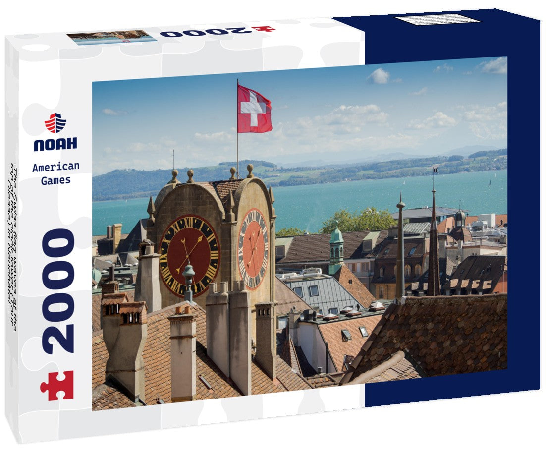 The Swiss flag waves at the top of the clock tower (Tour Diesse) in Neuchâtel 2000pc Puzzle