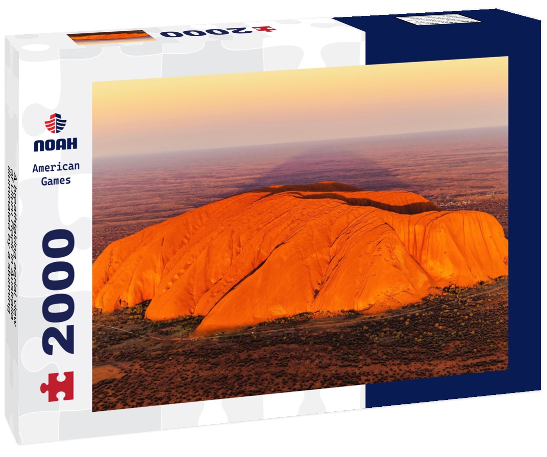 A breathtaking aerial view of Uluru Rock in Australia illuminated by a stunning sunset 2000pc Puzzle