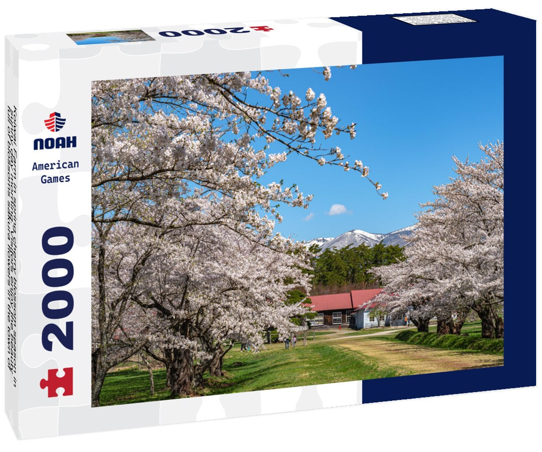 Koiwai Farm in spring cherry blossom season in sunny day morning. Visitors enjoy the beauty full of blossoms sakura flowers in the town of Shizukuishi, Iwate Prefecture, Japan 2000pc Puzzle