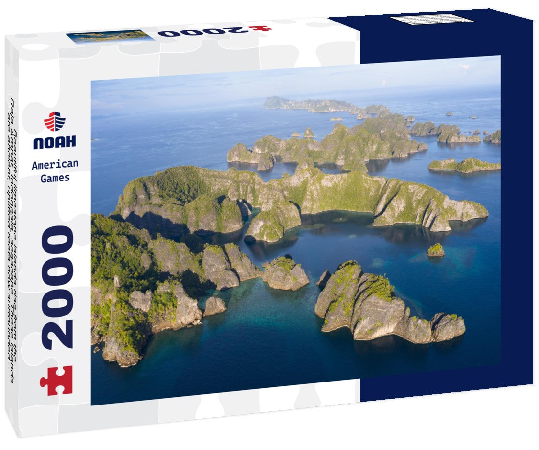 Beautiful limestone islands rise from the Raja Ampat, Indonesia, seascape. These islands are ancient, uplifted reefs now surrounded by young, fringing coral reefs 2000pc Puzzle