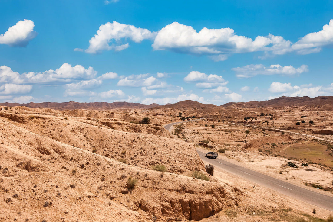 Landscape photography of the Sahara desert hills with sand dunes and road, vegetation and blue sky. View of the expanse of sandy desert summer sunny day, Sahara, Tozeur, Tunisia 2000pc Puzzle