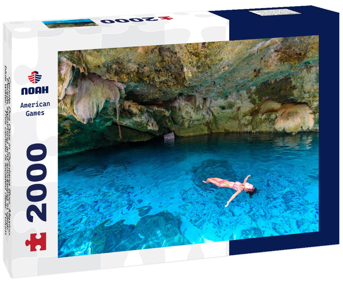 Cenote Dos Ojos in Quintana Roo, Mexico. People swimming and snorkeling in clear blue water. This cenote is located near Tulum on the Yucatan Peninsula, Mexico 2000pc Puzzle