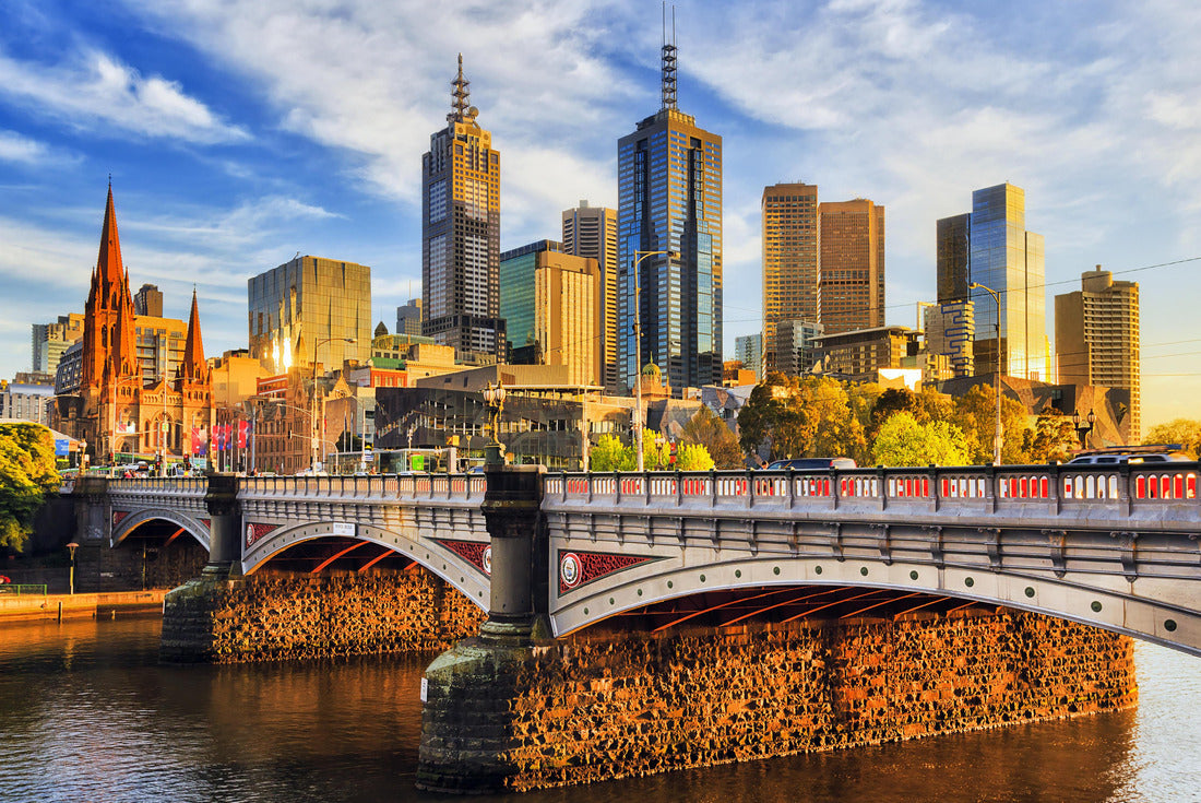 Warm morning light on high-rise towers in Melbourne CBD above Princes bridge across Yarra river 2000pc Puzzle