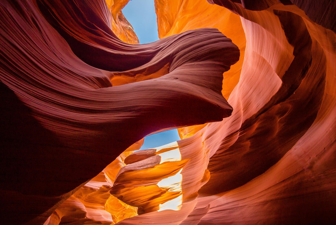 Beautiful wide angle view of amazing sandstone formations in the famous Antelope Canyon on a sunny day with blue sky near the old town of Page at the Powell River, American Southwest, Arizona, USA 2000pc Puzzle