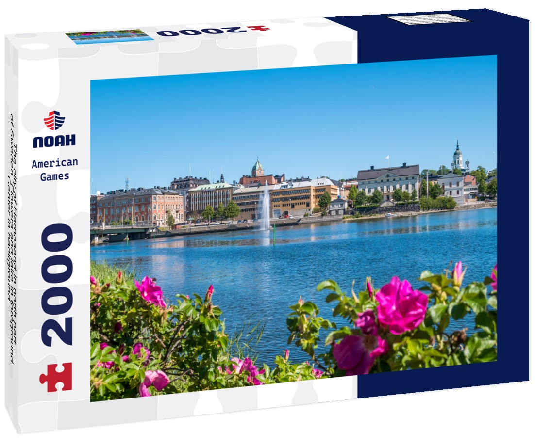 The city of Harnosand in north part of Sweden. Flowers and lake in foreground. Center in background 2000pc Puzzle
