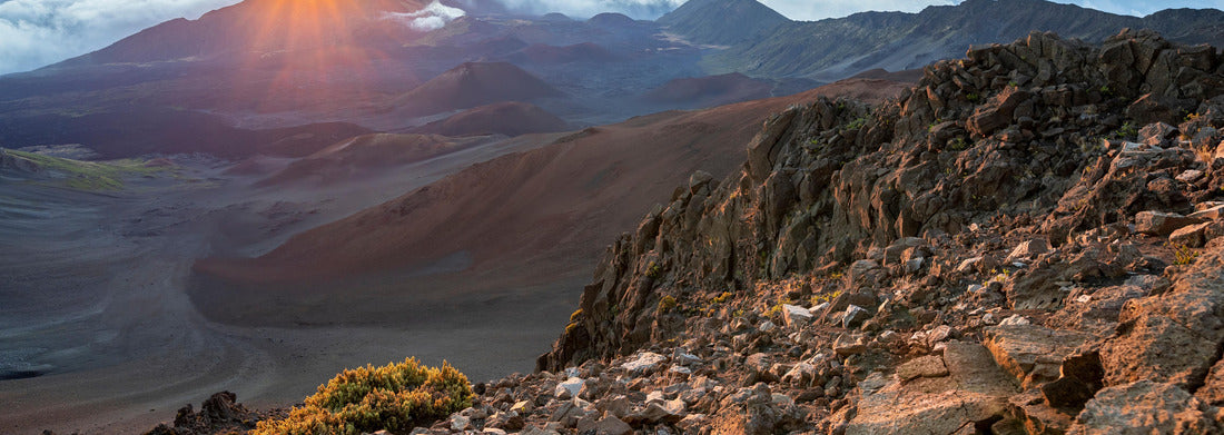 The sun rises dramatically over the dormant volcano and jagged peaks of Haleakala National Park on the island of Maui, Hawaii 1000pc Panoramic Puzzle