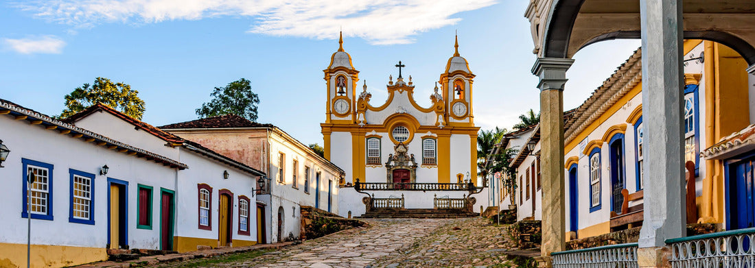 Noah Jigsaw Puzzle A quiet historic street in the city of Tiradentes in Minas Gerais, with colonial houses and a baroque church in the background panorama 1000 pieces