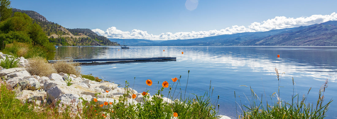 Noah Jigsaw Puzzle Kanagan Lake Canada. Summer landscape of a lake and mountains in the background in the early morning panorama 1000 pieces