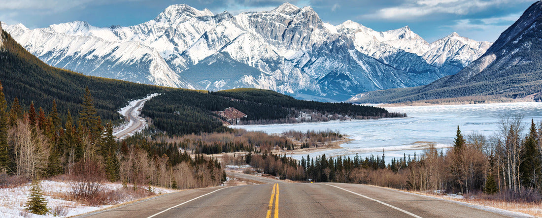 Highway with rocky mountains and frozen lake on Icefields Parkway, Alberta 2000pc Panoramic Puzzle