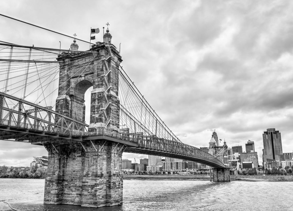 John A. Roebling Suspension Bridge across the Ohio River in Cincinnati in black white