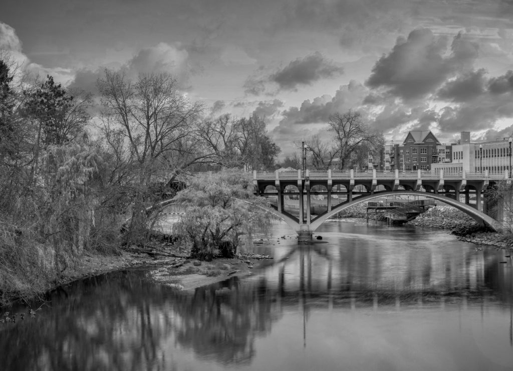 bridge over the rum river downtown Anoka Minnesota. Small town USA in black white