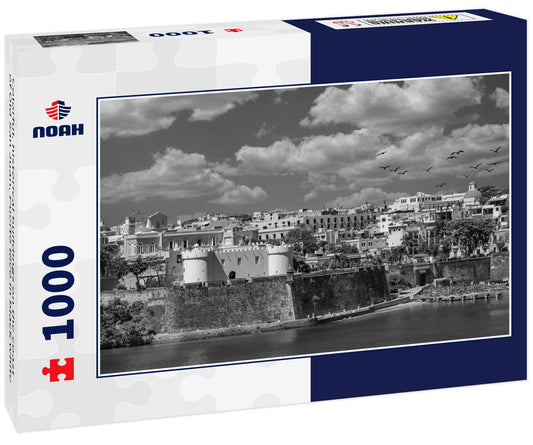 Colorful, historical buildings on the coast of Old San Juan, Puerto Rico in black white