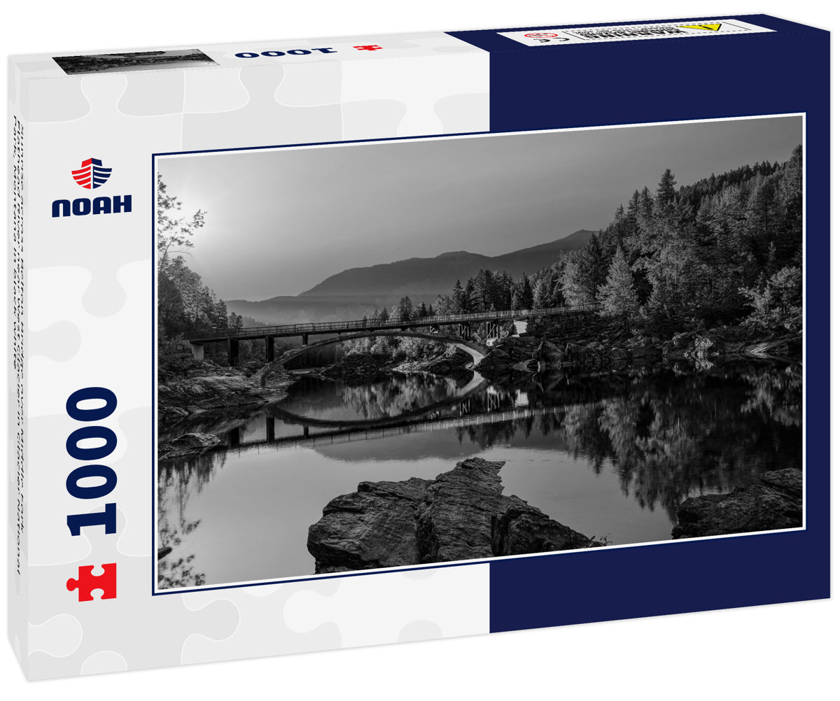 Sunrise across Belton Bridge over Middle Fork Flathead River near West Glacier in Glacier National Park, Montana in black white