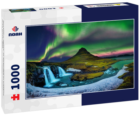 Northern lights, in Kirkjufell in Iceland with waterfalls