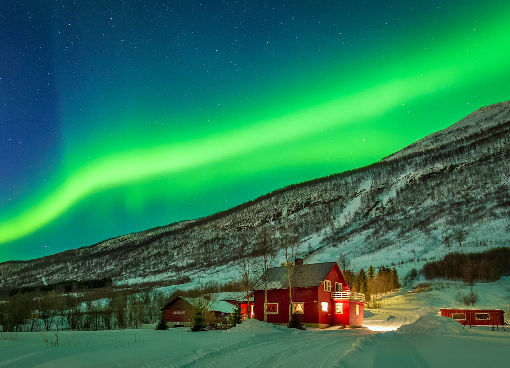 Northern lights over village in Norway