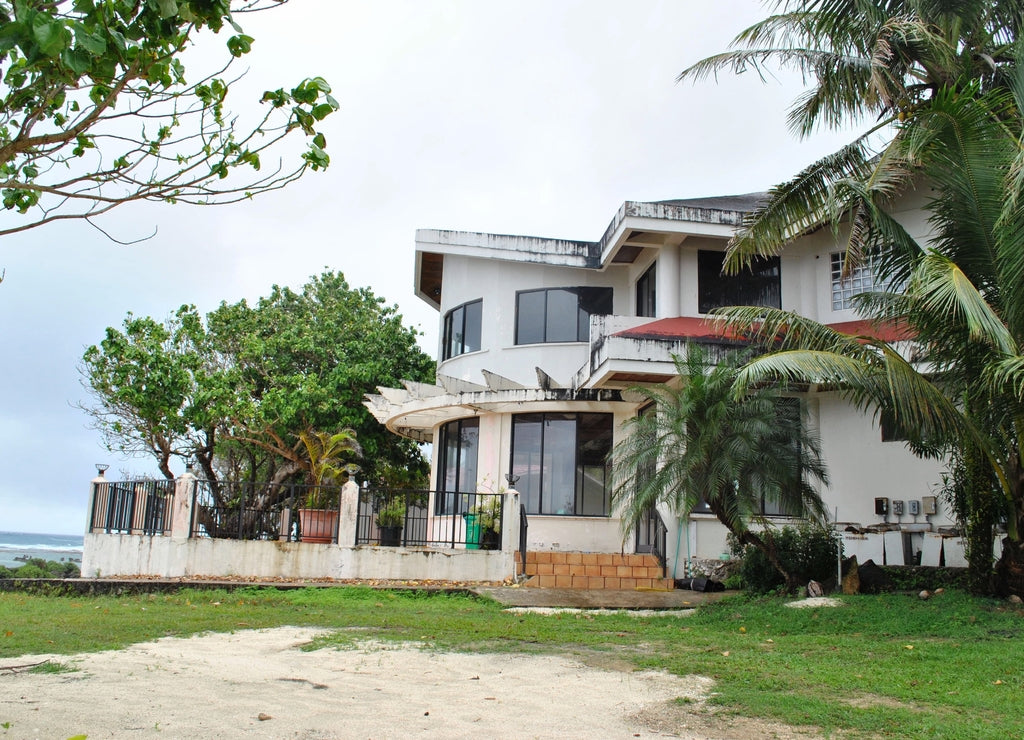 Abandoned resort building by the seaside on Rota, Northern Mariana Islands