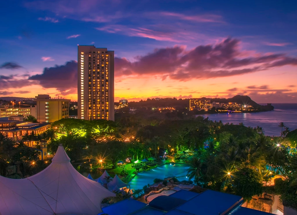 A dramatic sunset over Tumon Bay in Guam. Guam is one of the Mariana Islands in the Pacific Ocean