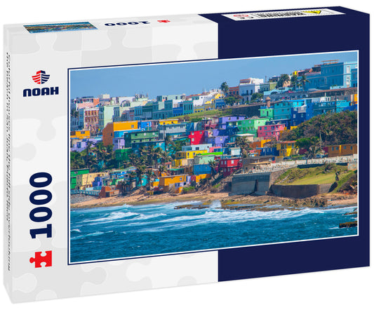 Colorful houses line the hill side overlooking the beach in San Juan, Puerto Rico