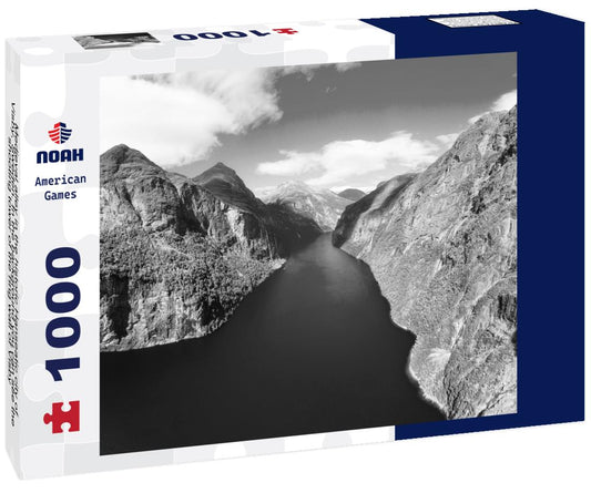 Noah Jigsaw Puzzle Medieval alley in the historic Hanseatic city of Visby, Sweden. In the background you can see the shooting tower of the ring wall of Visby, a UNESCO World Heritage Site in black white 1000 pieces