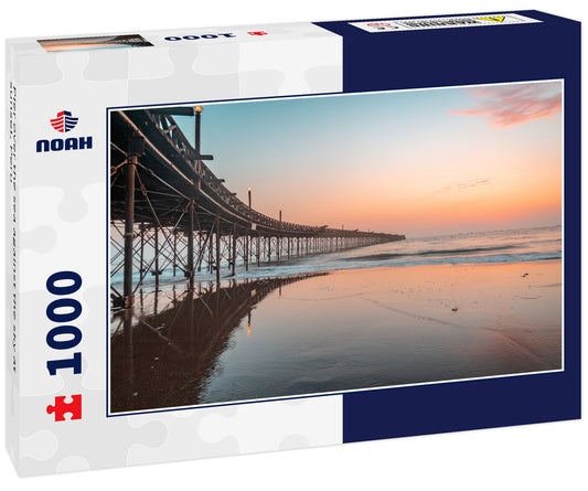 Pier over the sea against the sky at sunset, Peru