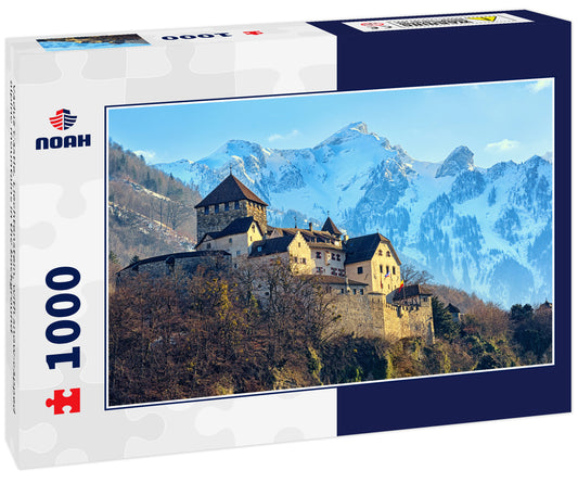 Vaduz Castle, Liechtenstein, with snow-capped alpine mountains in the background