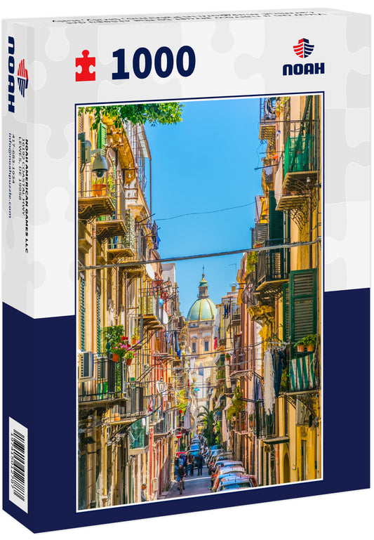 View on a narrow street to the chiesa del carmine maggiore in Palermo, Sicily, Italy