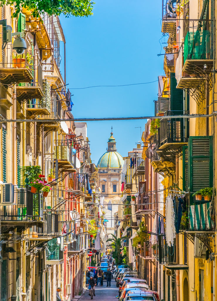 View on a narrow street to the chiesa del carmine maggiore in Palermo, Sicily, Italy