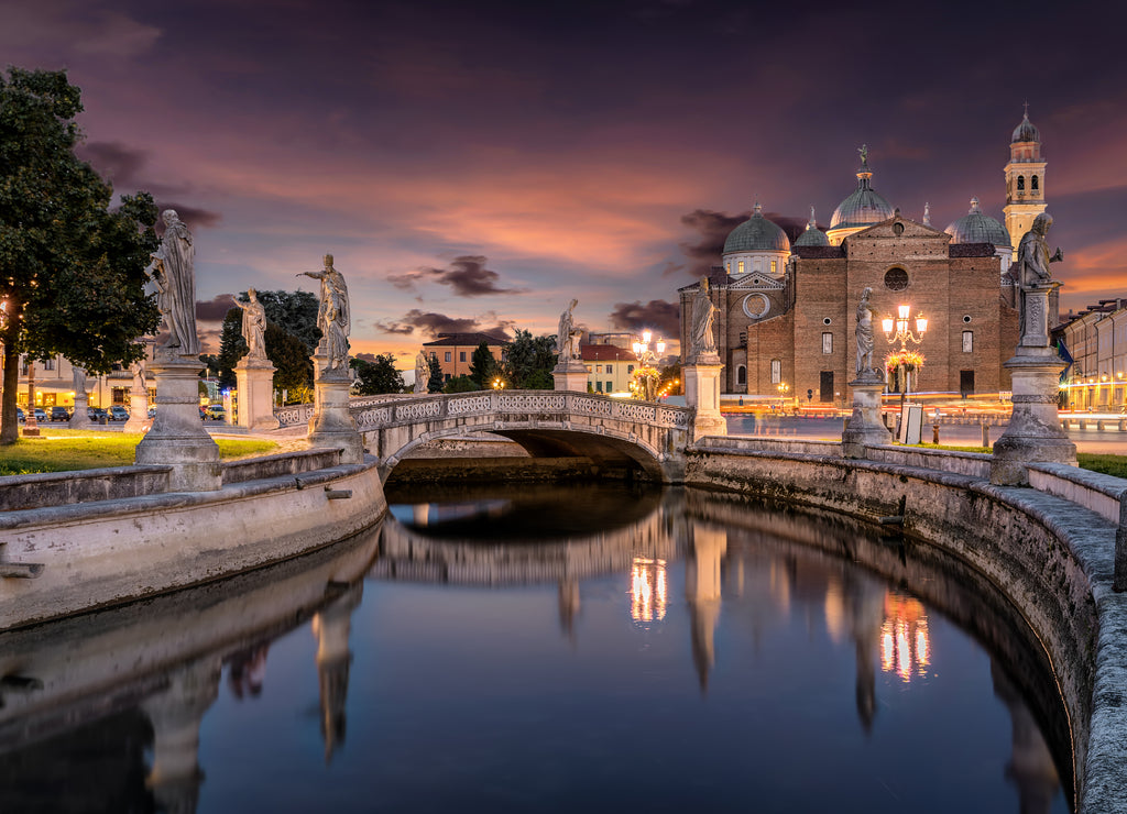 The Prato della Valle with view of the Basilica of St. Giustina at sunset in Padova, Italy