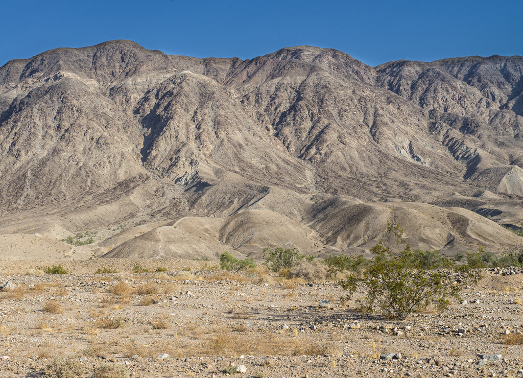 Landscape, mountains on the road from Mexicali to Tijuana, on the Baja Peninsula, MEXICO on a sunny morning and blue sky