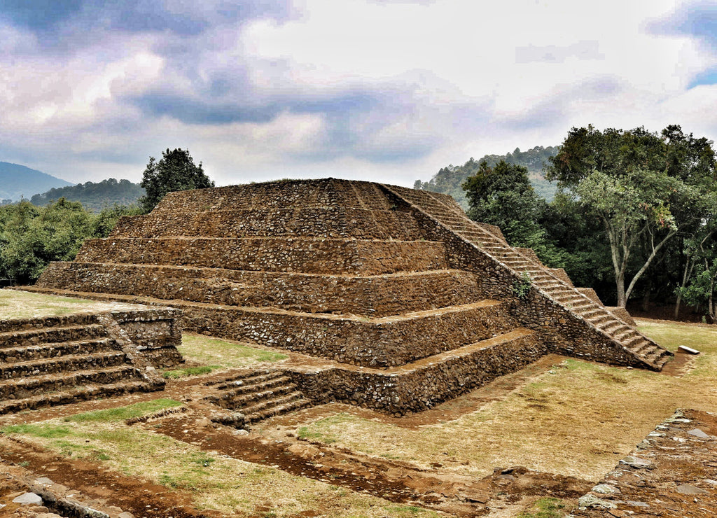Ancient ruins against cloudy sky, Mexico
