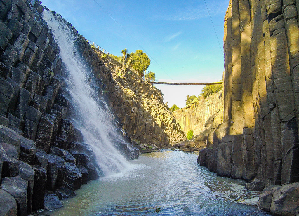 Park of basalt prisms, Mexico. Beautiful waterfalls among the geometric rocks in the state of Hidalgo, Mexico